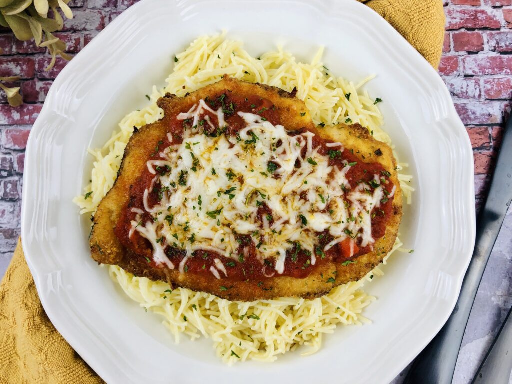 Copy Cat Easy Baked Chicken Parmesan Recipe on www.theaffordablefoodie.com