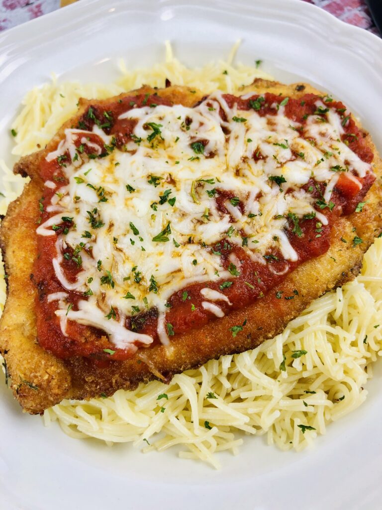 Copy Cat Easy Baked Chicken Parmesan Recipe on www.theaffordablefoodie.com