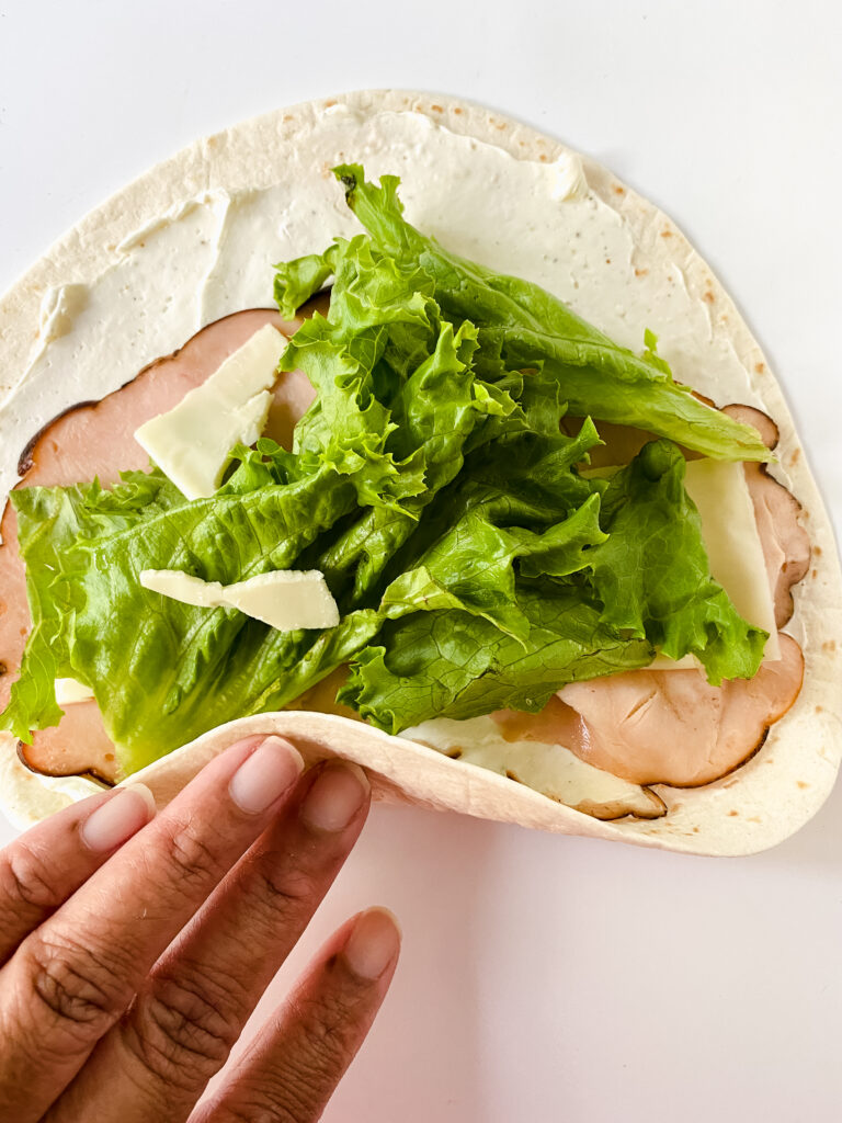 Copy Cat Recipe on Savory Turkey Pinwheel Sandwiches Recipe on www.theaffordablefoodie.com