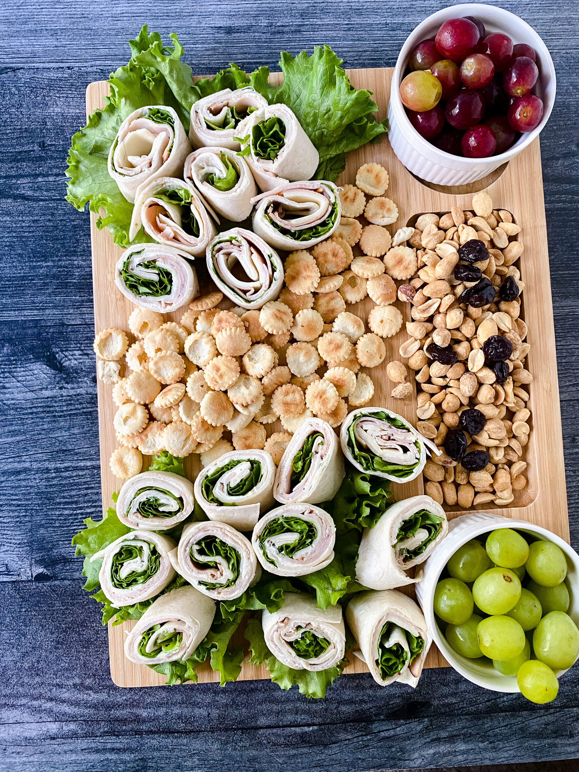 turkey pinwheels on charcuterie board