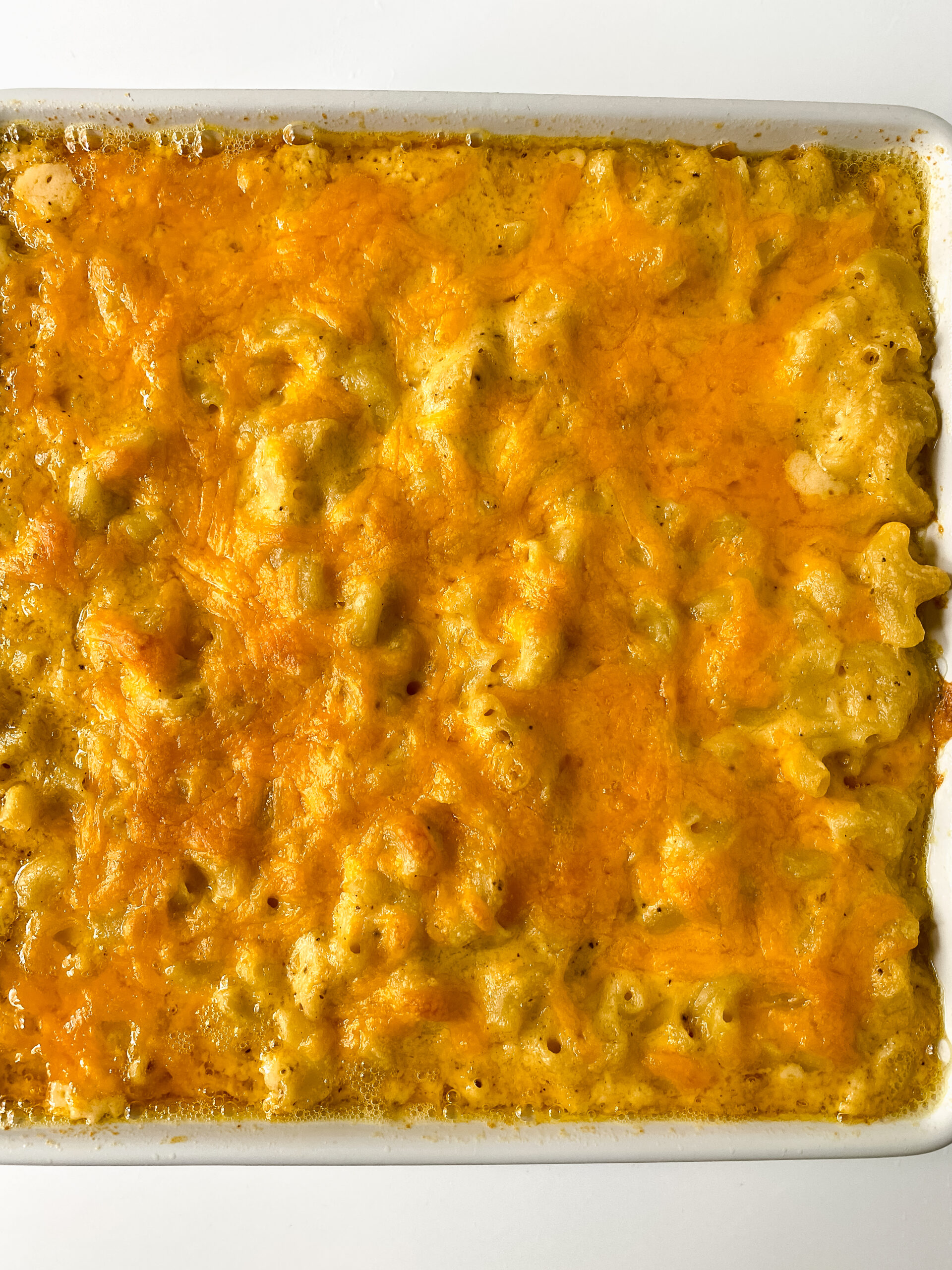 Easy baked macaroni and cheese baked until golden, bubbly, and melted on top.