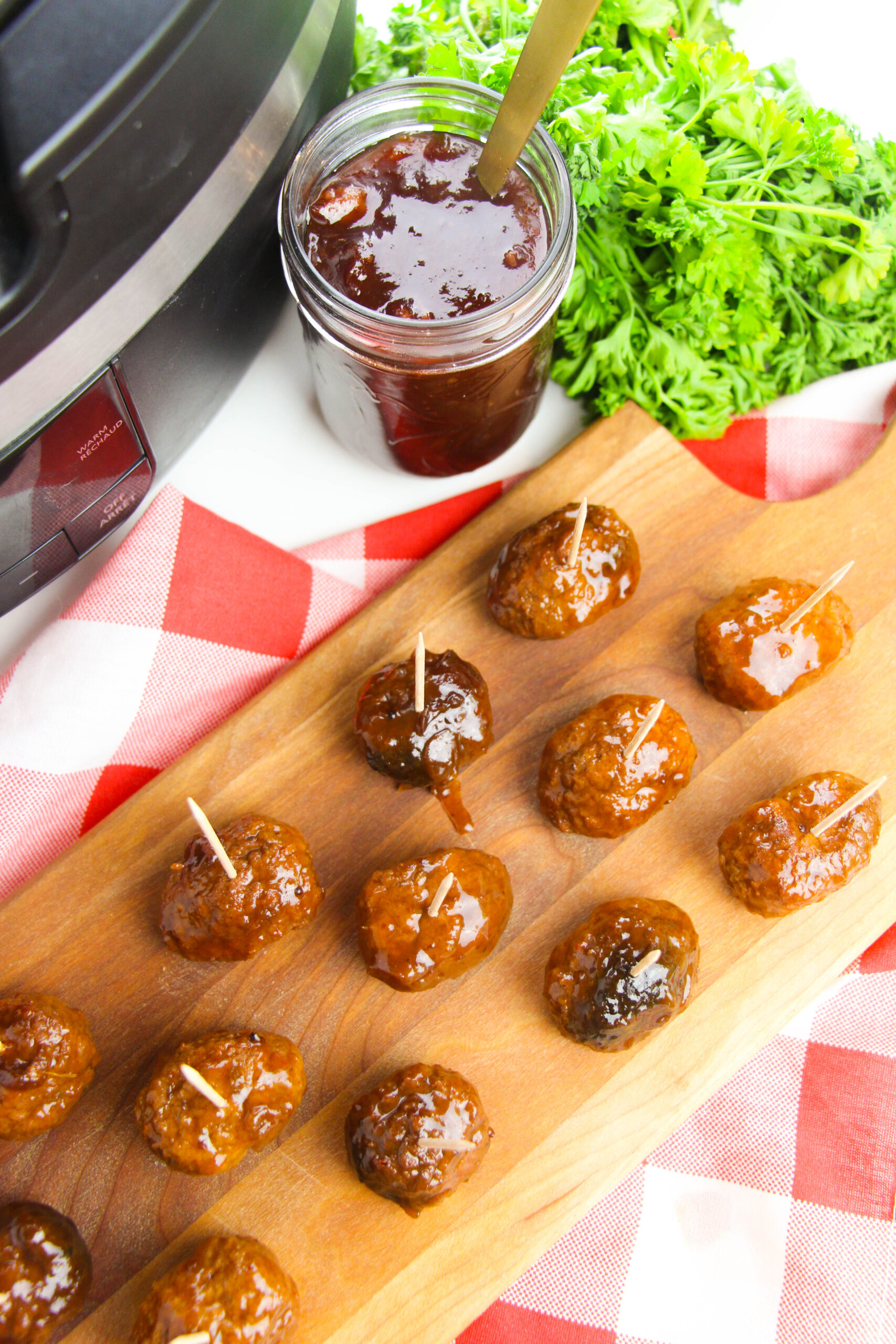 Juicy meatballs coated in a glossy cranberry sauce, served warm on a platter. The perfect mix of sweet and savory for holidays or parties.