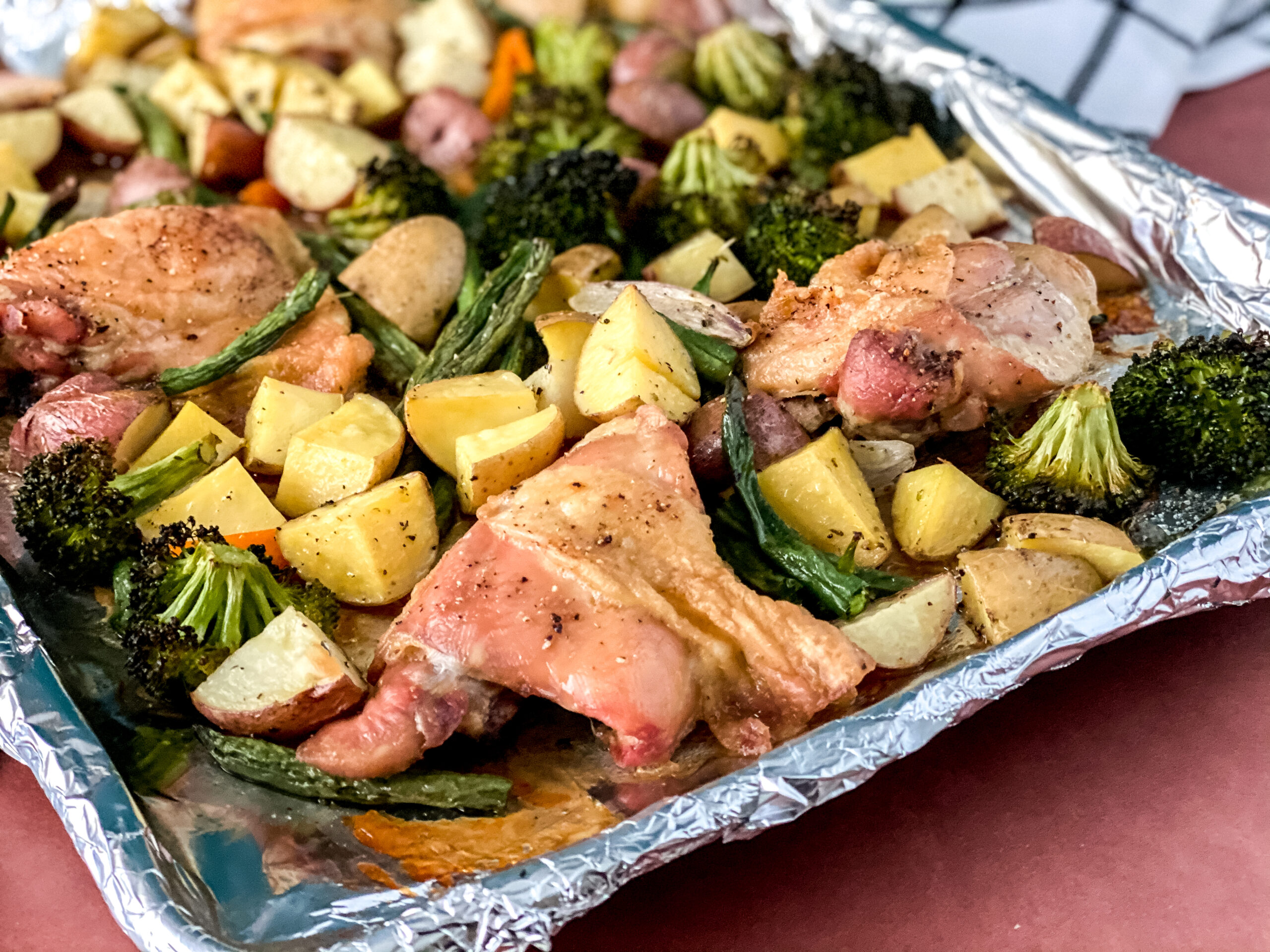 Sheet Pan Roasted Chicken and Vegetables at www.theaffordablefoodie.com