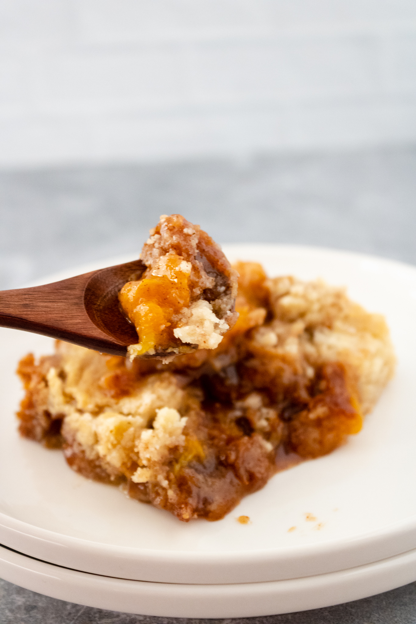Cake Mix Peach Cobbler at www.theaffordablefoodie.com