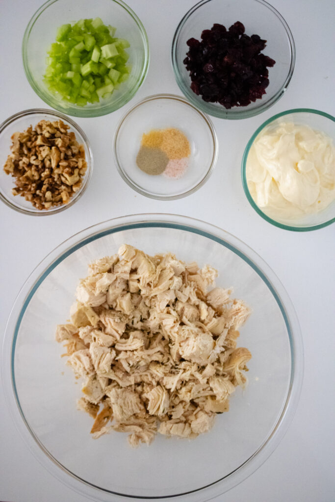 chicken, walnuts, mayo, celery, spices on a white board