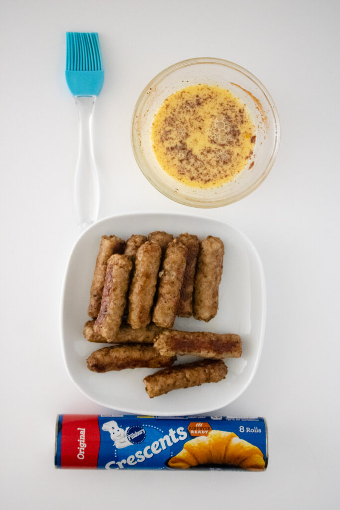 sausage, french toast and a pastry brush