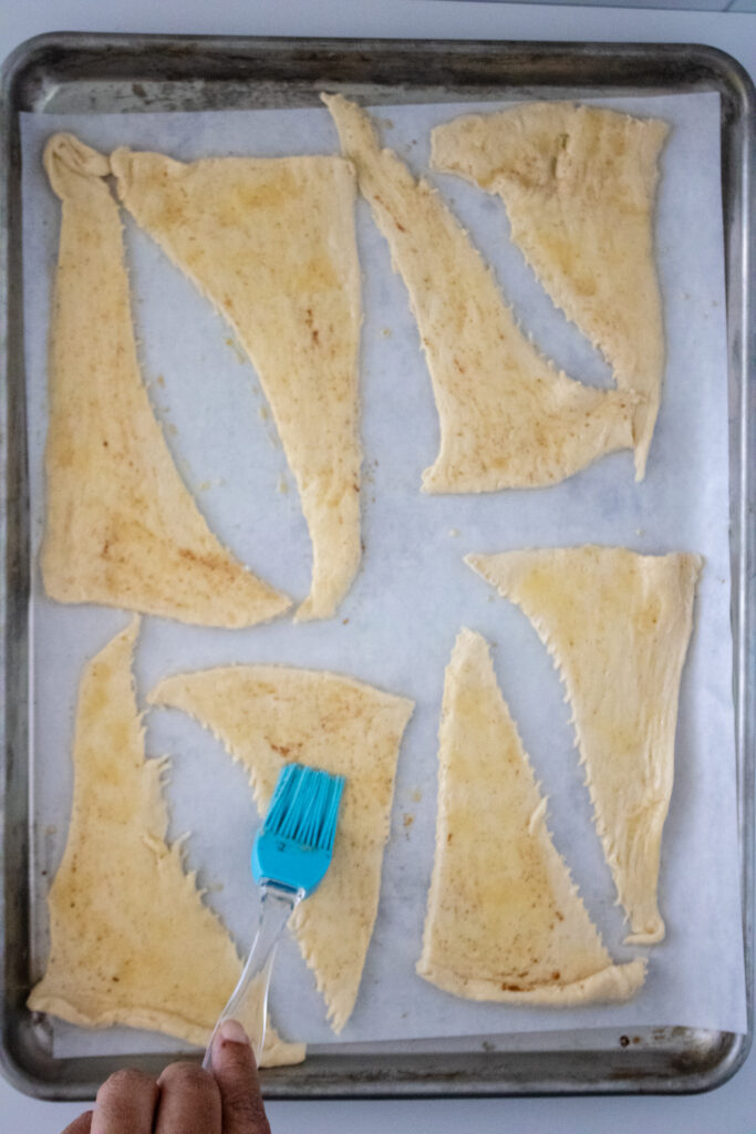 crescent rolls with french toast mix brushed on it