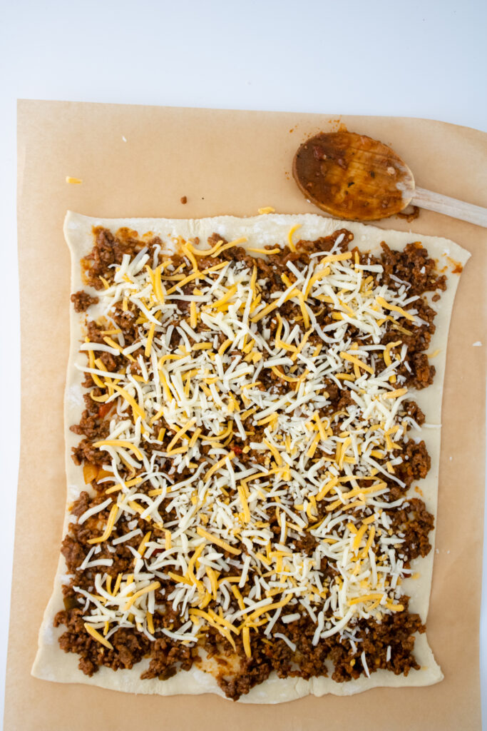taco meat, cheese on puff pastry